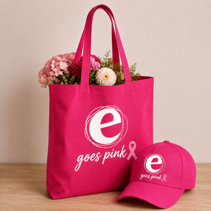 Pinke Einkaufstasche und pinke Kappe mit dem Logo von Eisenstadt goes Pink